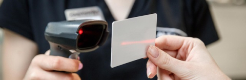 Visitor scanning a badge